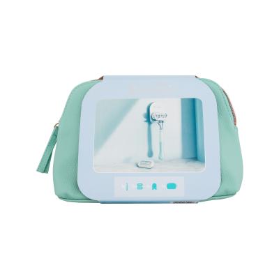 Gillette Venus Extra Smooth Sensitive Darčeková kazeta holiaci strojček Venus Extra Smooth Sensitive 1 ks + náhradná hlavica Venus 1 ks + držiak na holiaci strojček + kozmetická taštička